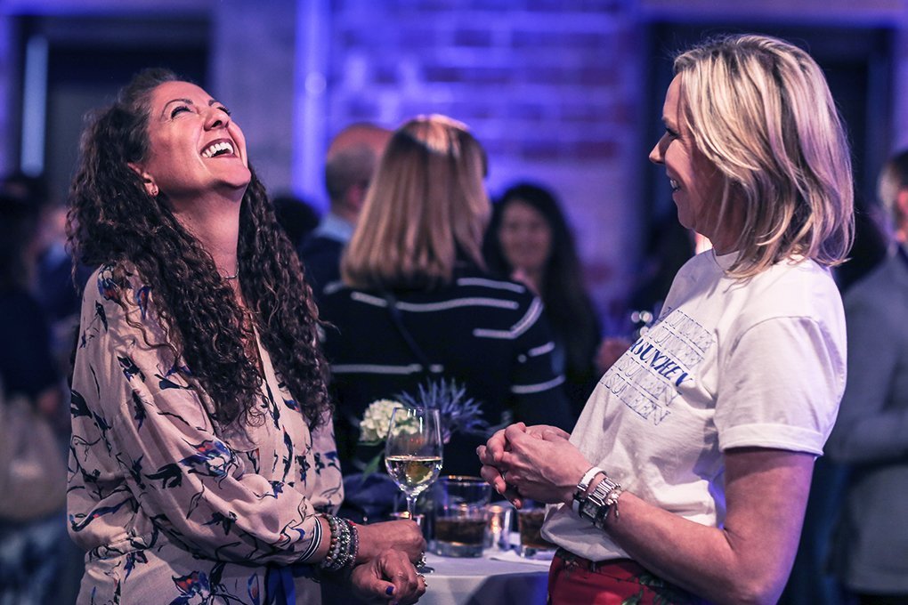 Sephora's Artemis Patrick has a laugh with Supergoop founder Holly Thaggard at the BeautyX Retail Summit in Dallas.