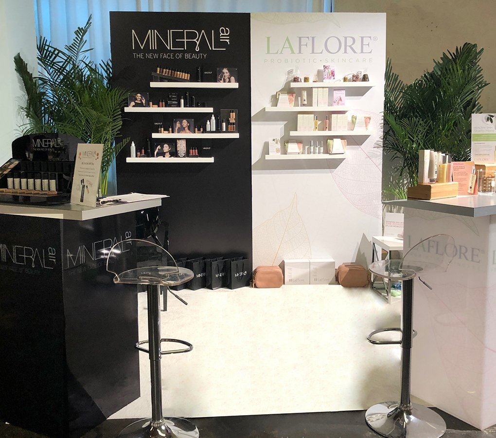 A shared exhibition space offers economic advantages but presents many practical challenges. Mineral Air and LaFlore Probiotic Skincare were two brands that collaborated in their mutual presentation without sacrificing individual brand image.